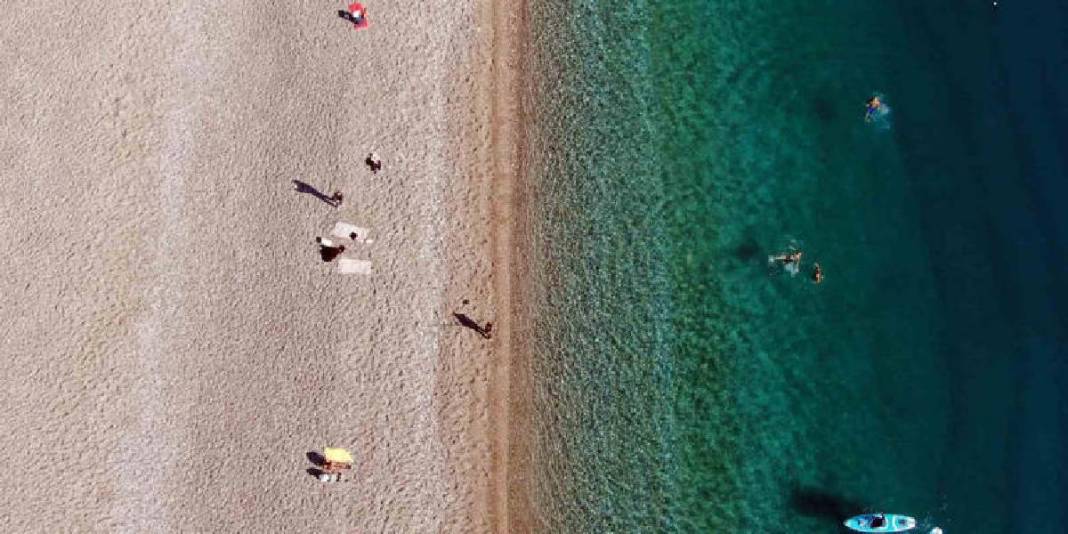 Yüksekte kar alçakta deniz keyfi! Aralık ayında yazı yaşadılar: Herkes donarken onların deniz keyfi imrendirdi 4